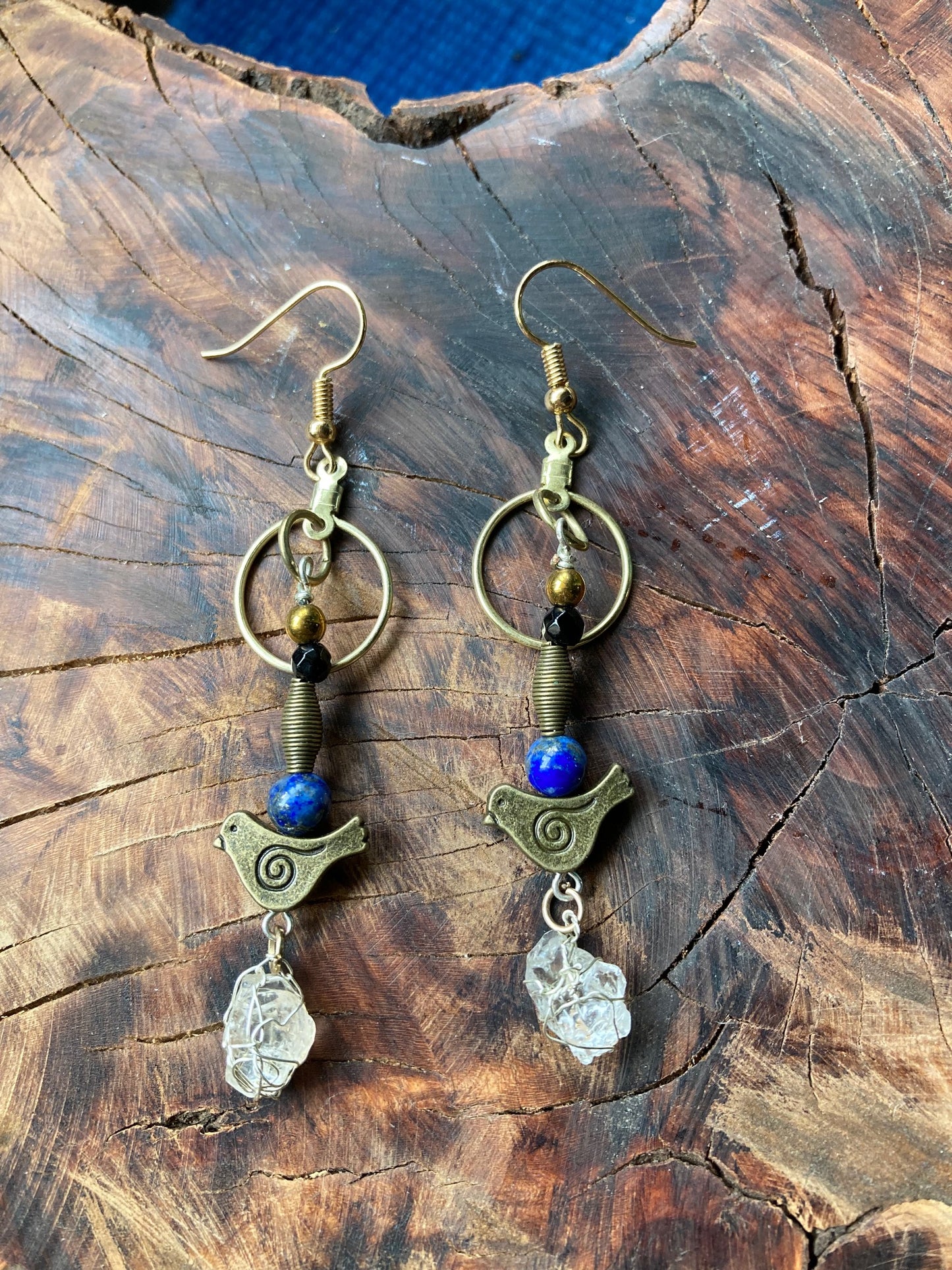 Dangling bronze birds with Northern California Diamond earrings