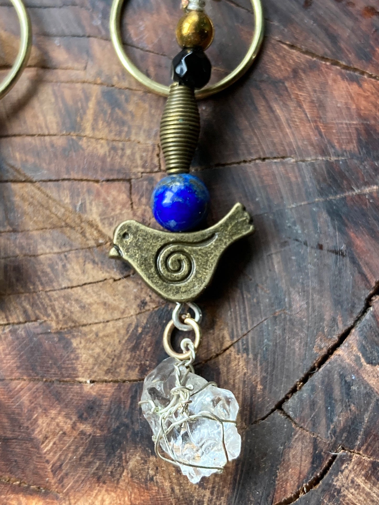 Dangling bronze birds with Northern California Diamond earrings