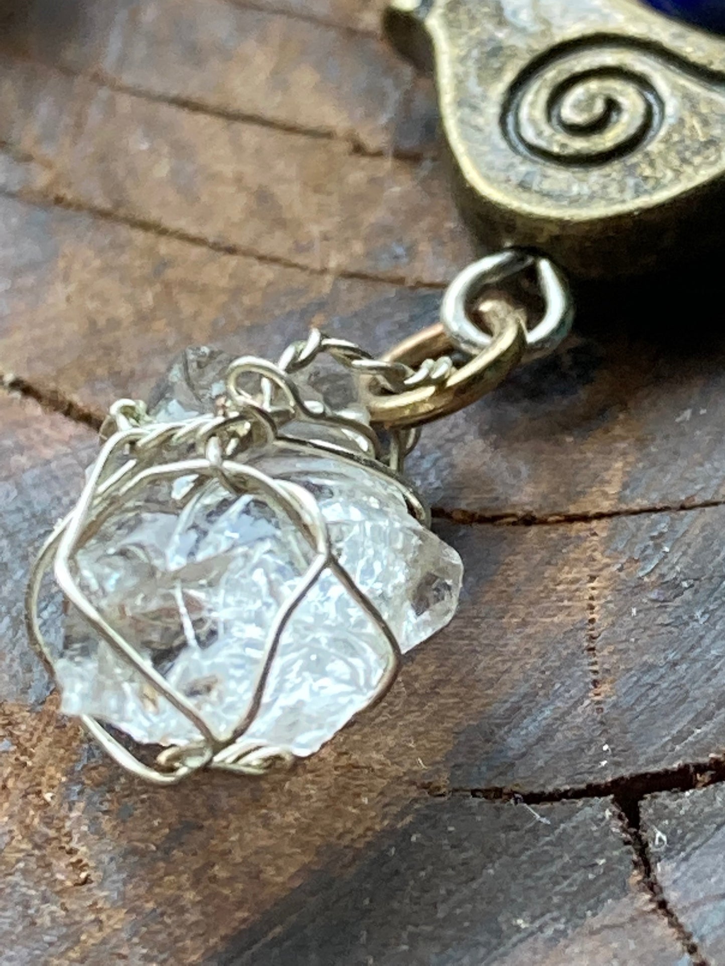 Dangling bronze birds with Northern California Diamond earrings