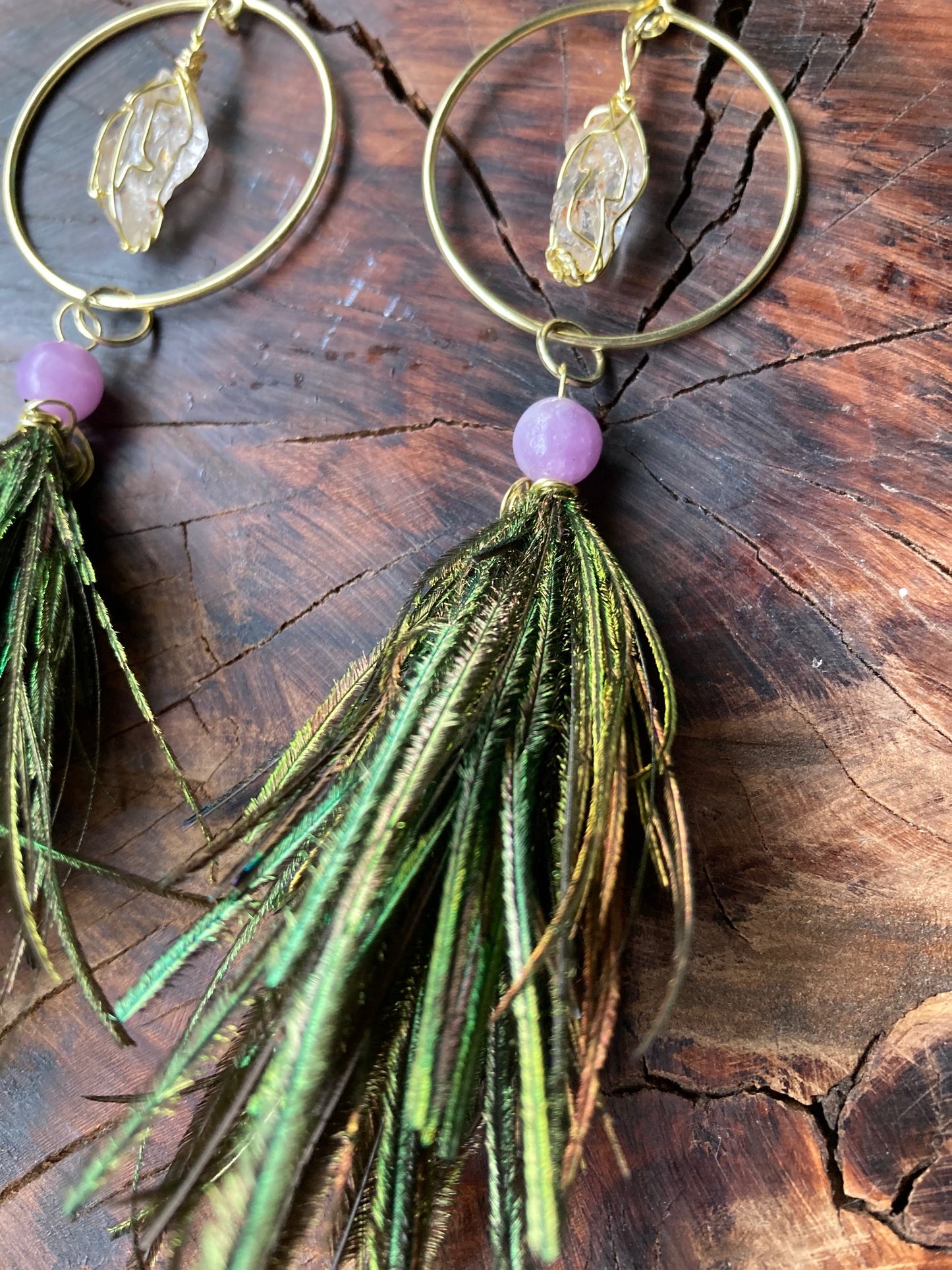 Gold circles with Northern California diamonds and pixy cut peapoofs with purple jade beads