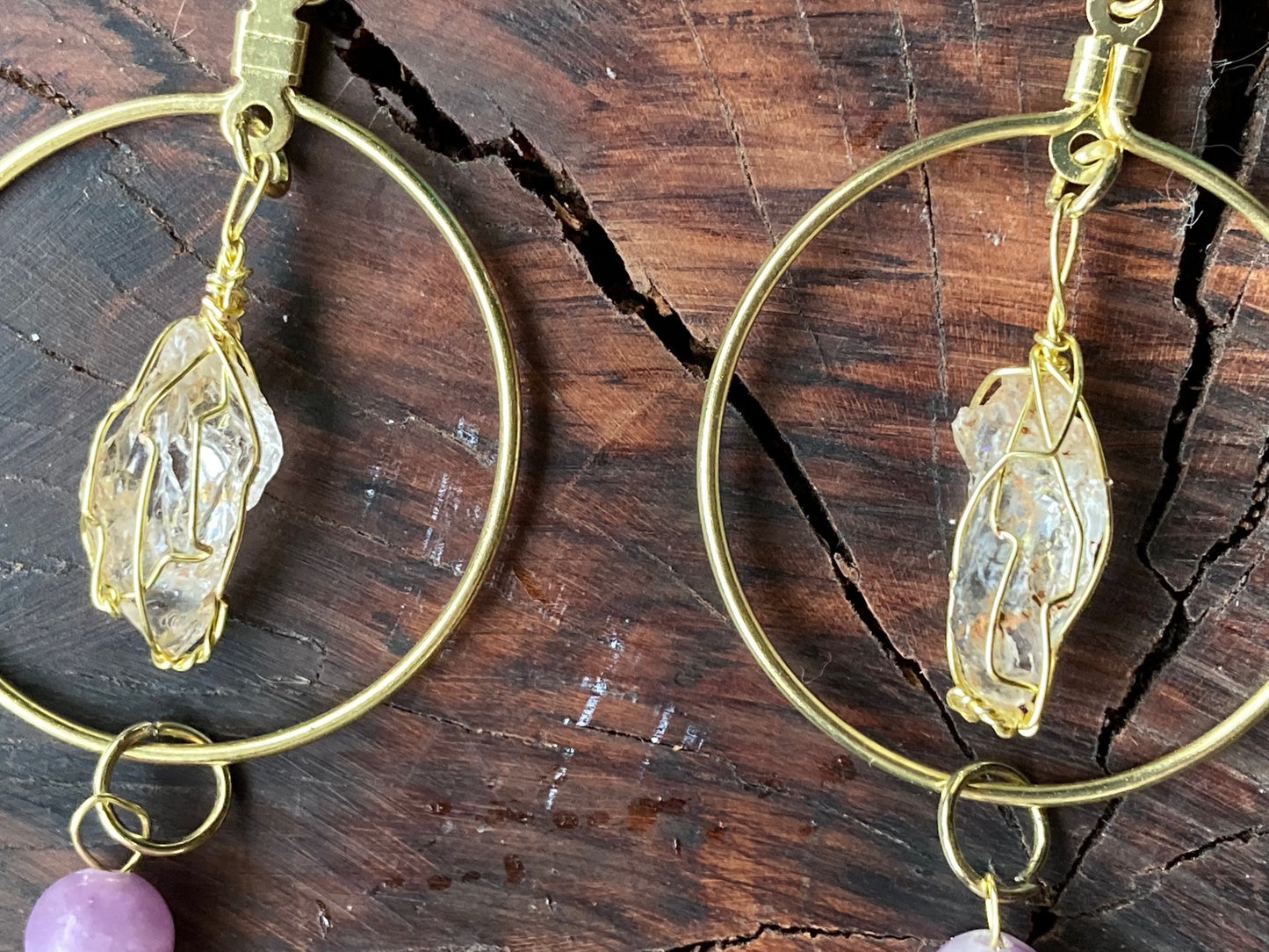 Gold circles with Northern California diamonds and pixy cut peapoofs with purple jade beads