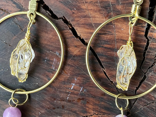 Gold circles with Northern California diamonds and pixy cut peapoofs with purple jade beads