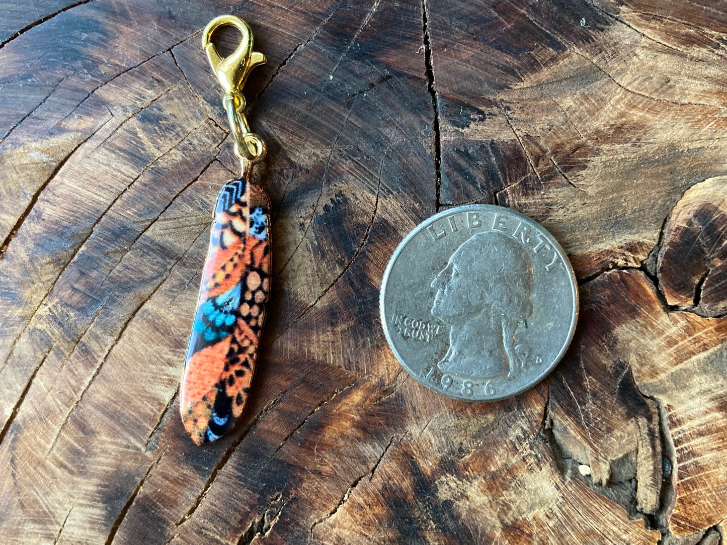 Enamel feather hook charm
