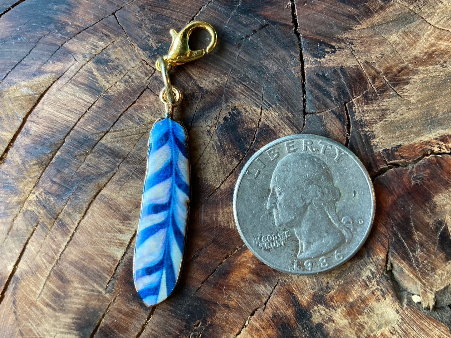 Enamel feather hook charm